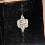 11x8mm Radiant moissanite with round and pear side stones