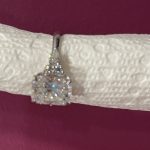 11x8mm Radiant moissanite with round and pear side stones