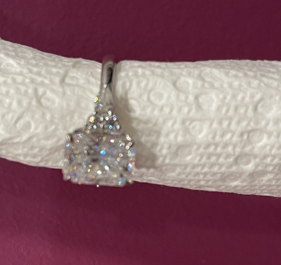 11x8mm Radiant moissanite with round and pear side stones