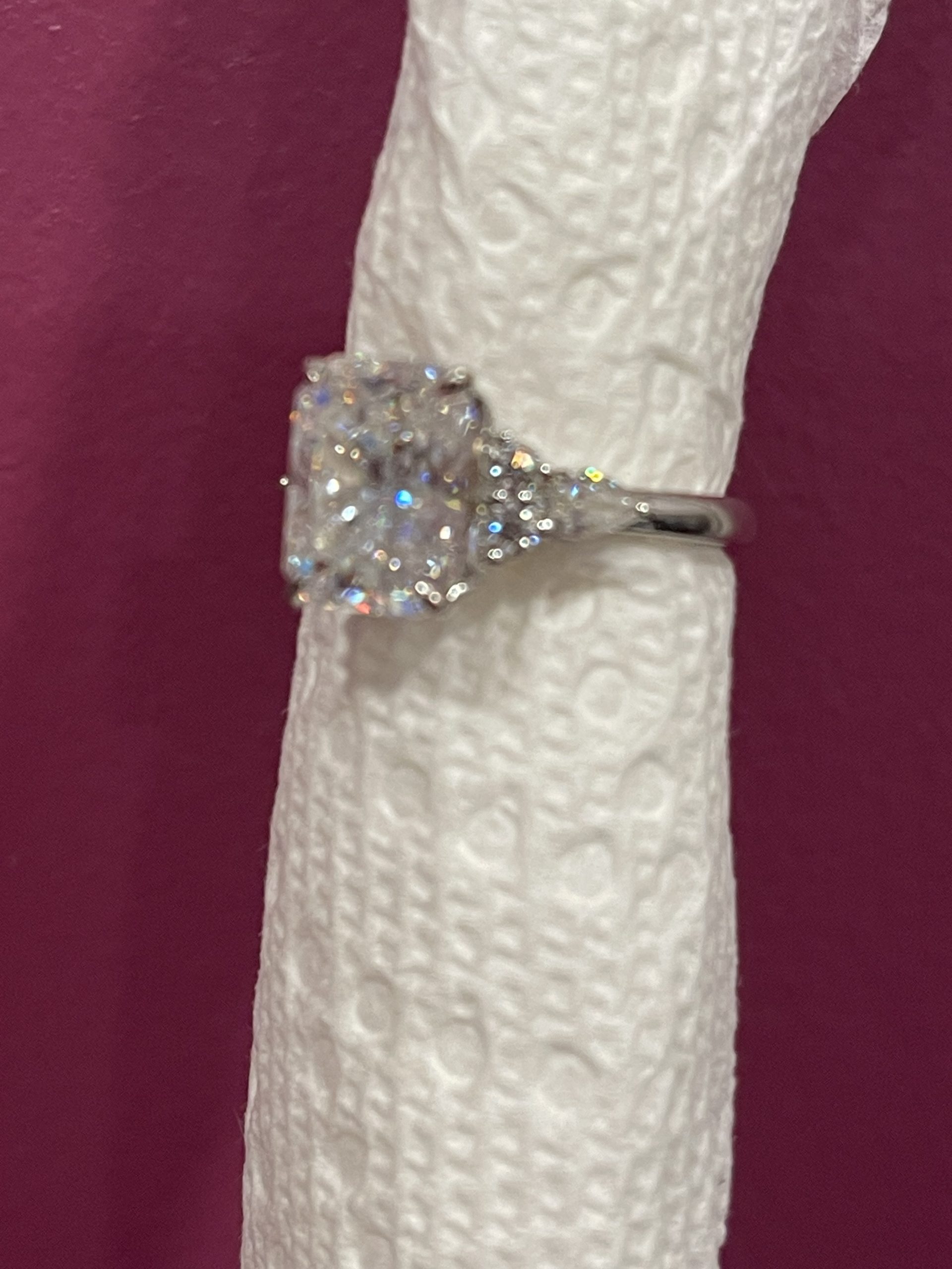 11x8mm Radiant moissanite with round and pear side stones