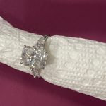 11x8mm Radiant moissanite with round and pear side stones