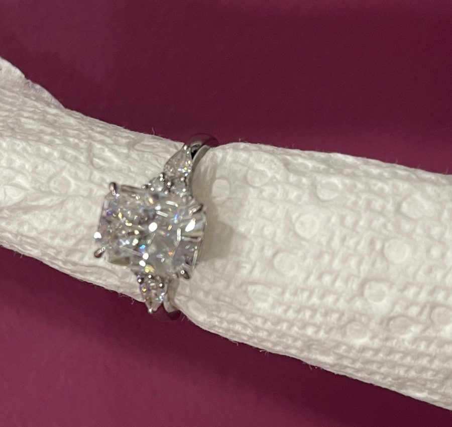 11x8mm Radiant moissanite with round and pear side stones