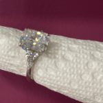 11x8mm Radiant moissanite with round and pear side stones
