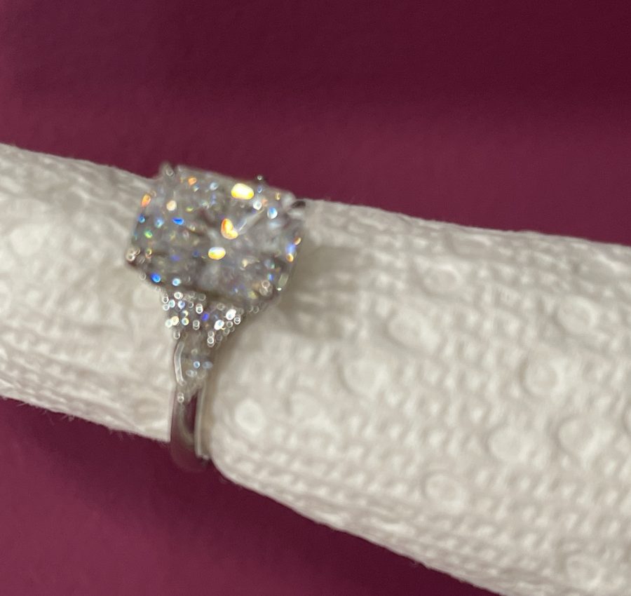 11x8mm Radiant moissanite with round and pear side stones