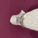 11x8mm Radiant moissanite with round and pear side stones