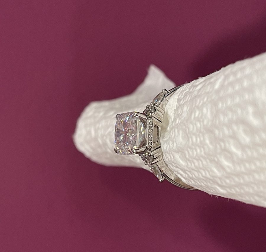 11x8mm Radiant moissanite with round and pear side stones