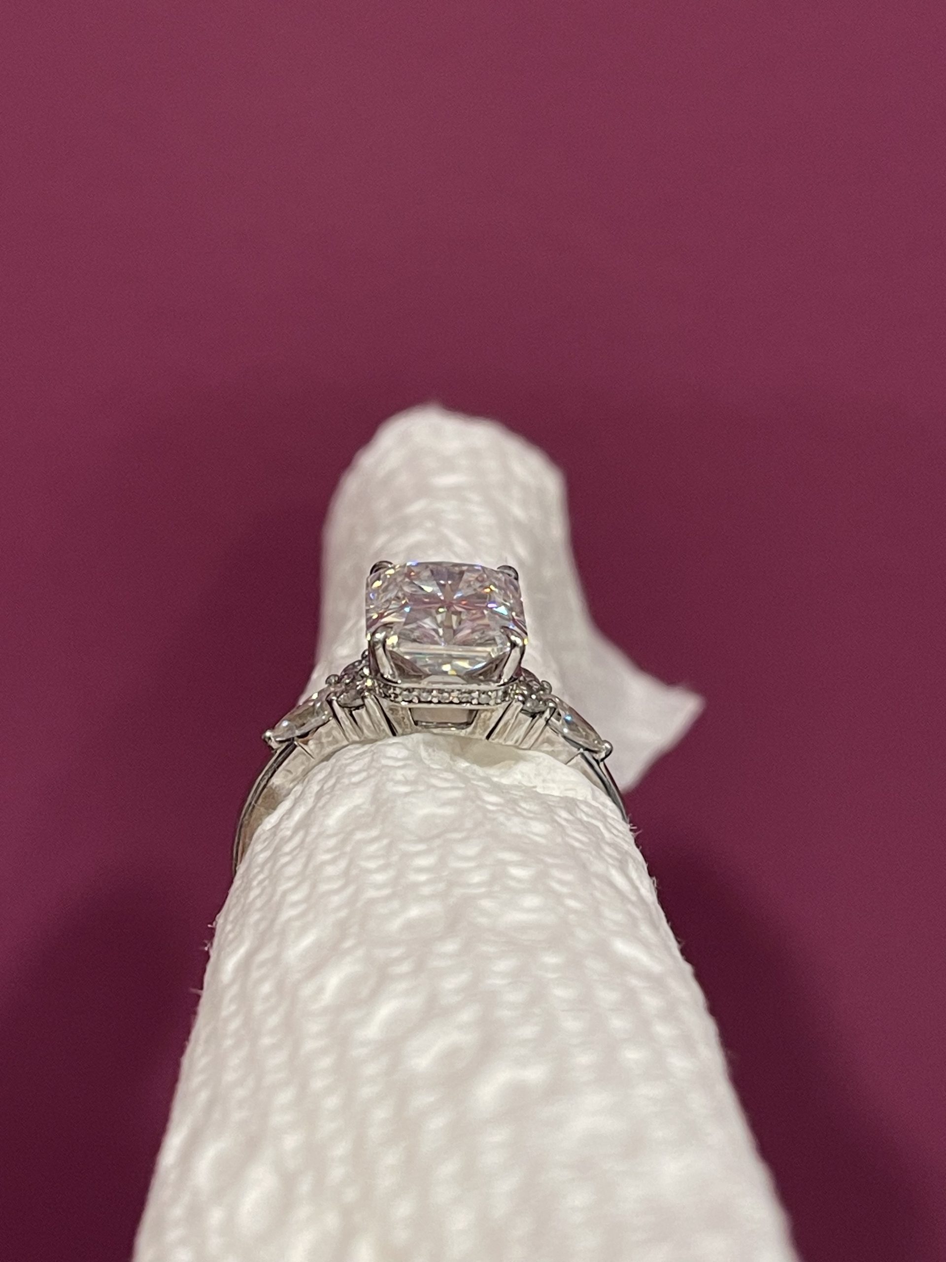 11x8mm Radiant moissanite with round and pear side stones