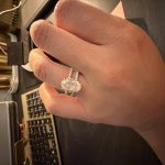 4.1 carat Oval Pavé 1.8mm U-prong pavé bands and an invisible halo