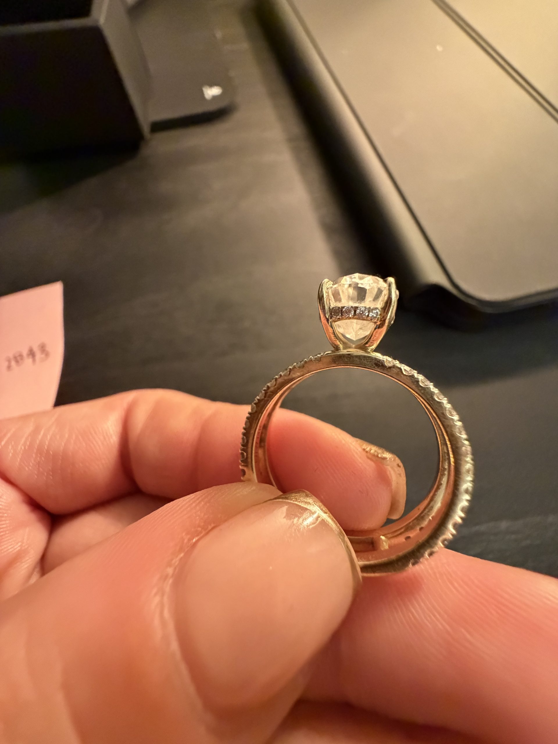 4.1 carat Oval Pavé 1.8mm U-prong pavé bands and an invisible halo