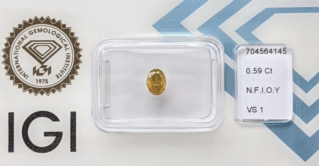 IGI Certified – 0.59 ct – Natural VS1 Diamond Fancy Intense Orangy Yellow -Oval-